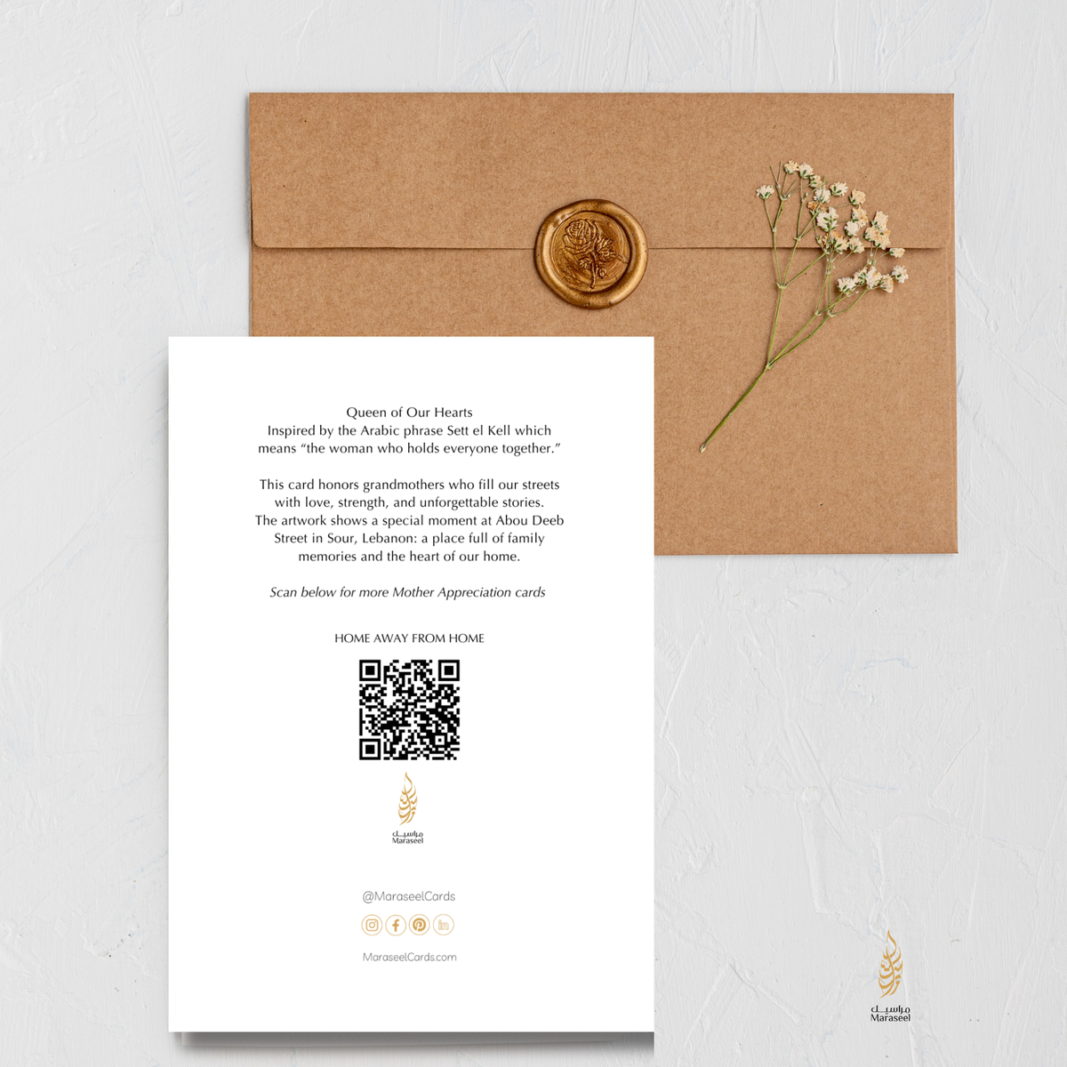 Kraft paper envelope with a white card featuring text and a QR code, on a light gray background.
