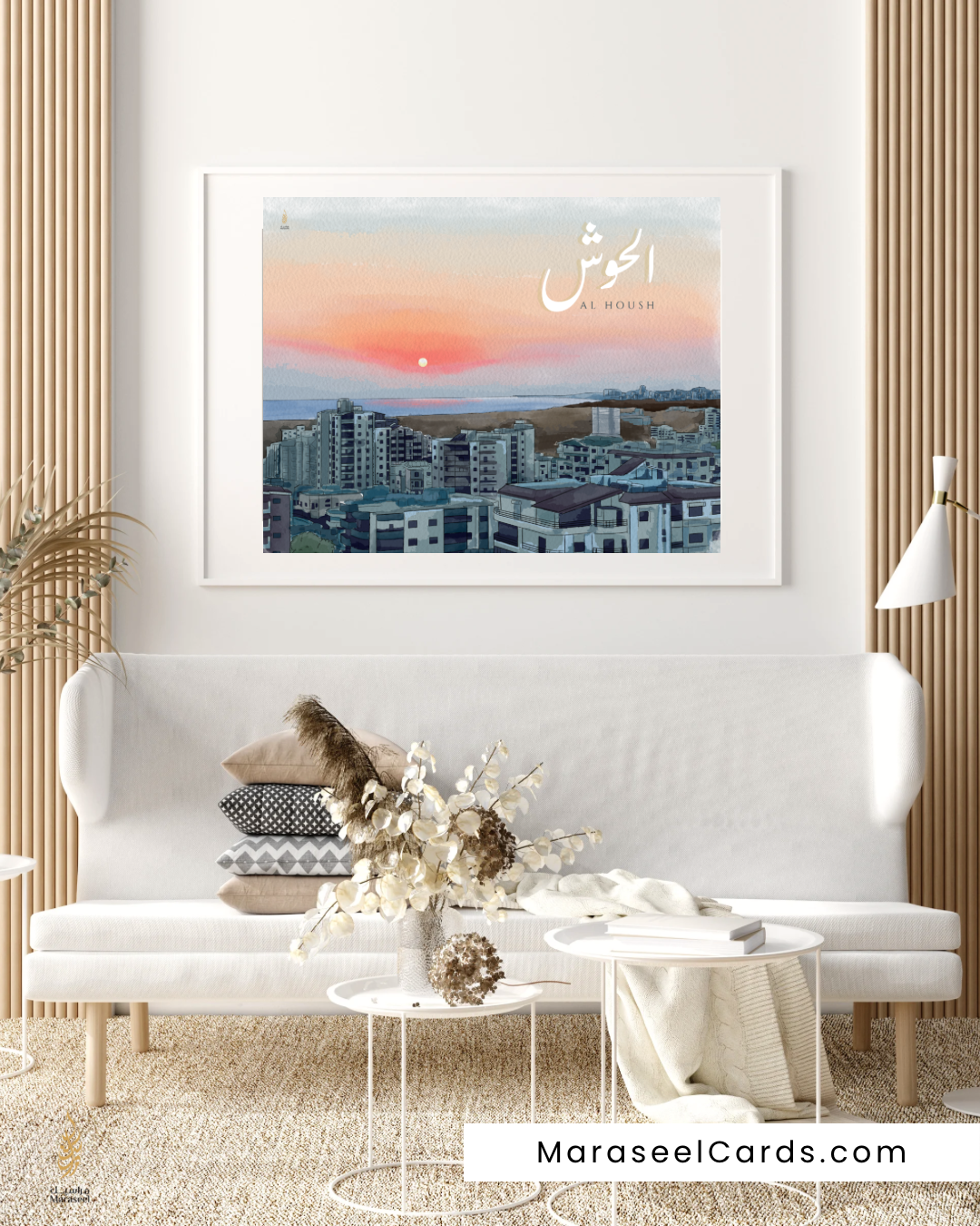Framed artwork of a cityscape on a wall in a living room with decor elements for Al Housh South Lebanon