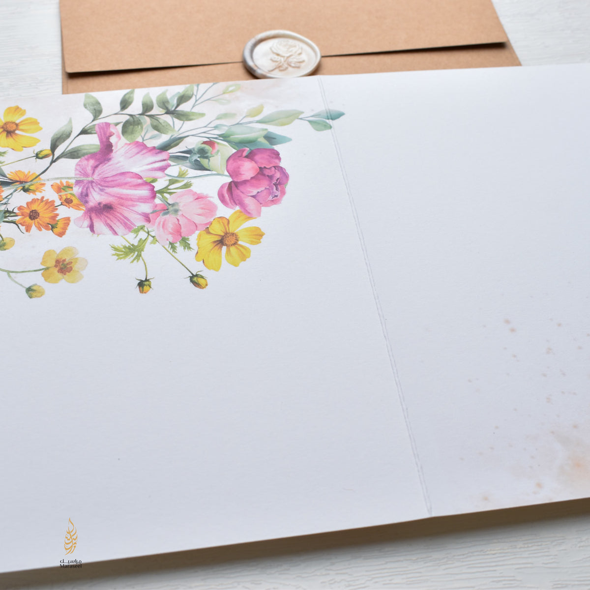 Floral stationary set with a letterhead and envelope on a white background