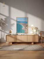 Load image into Gallery viewer, Wooden cabinet with decorative items in a room with a large window for Art Print Tyre South  Lebanon 
