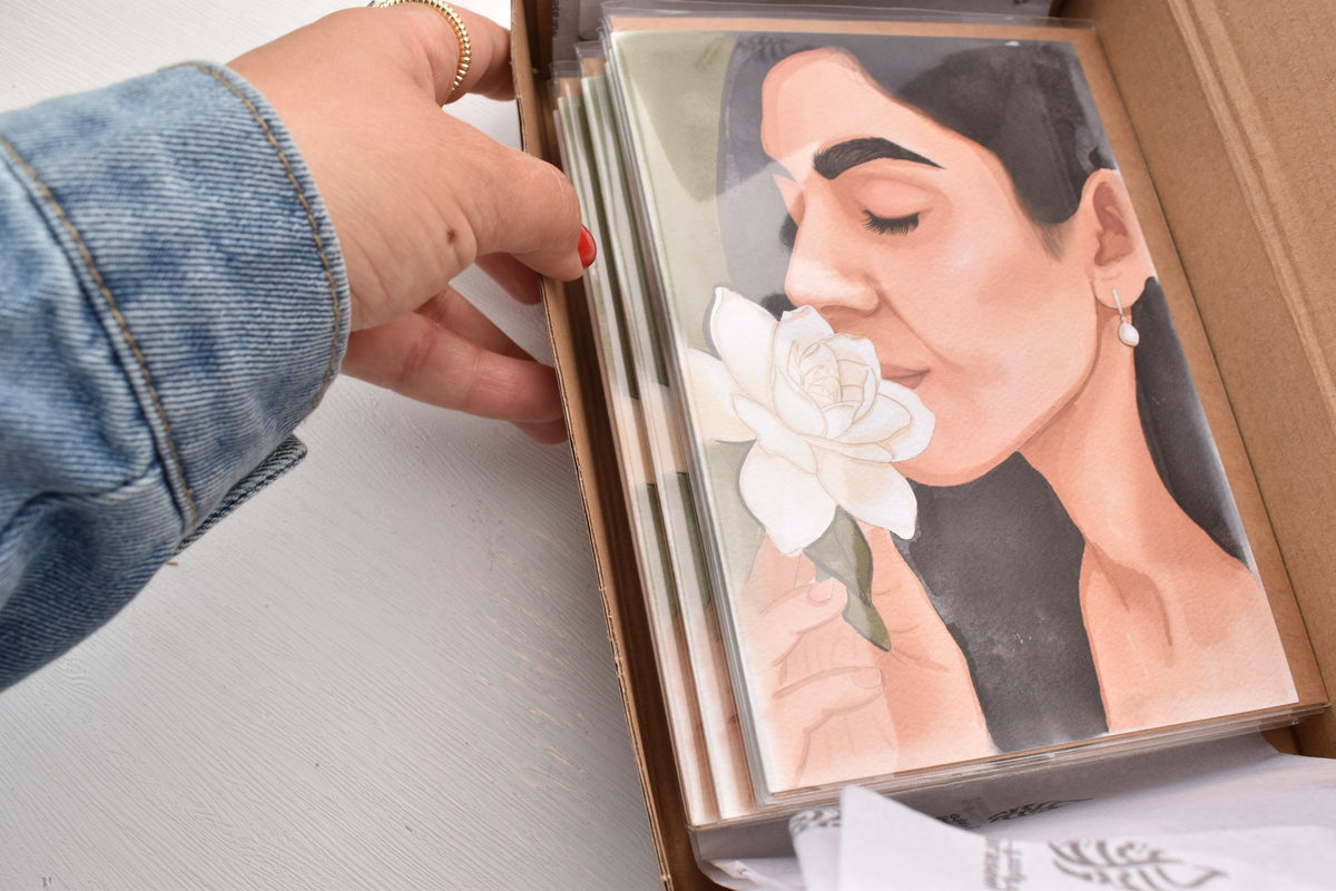 Lifting the Miss You (اشتقتلك) Gardenia card out of a Maraseel card set box